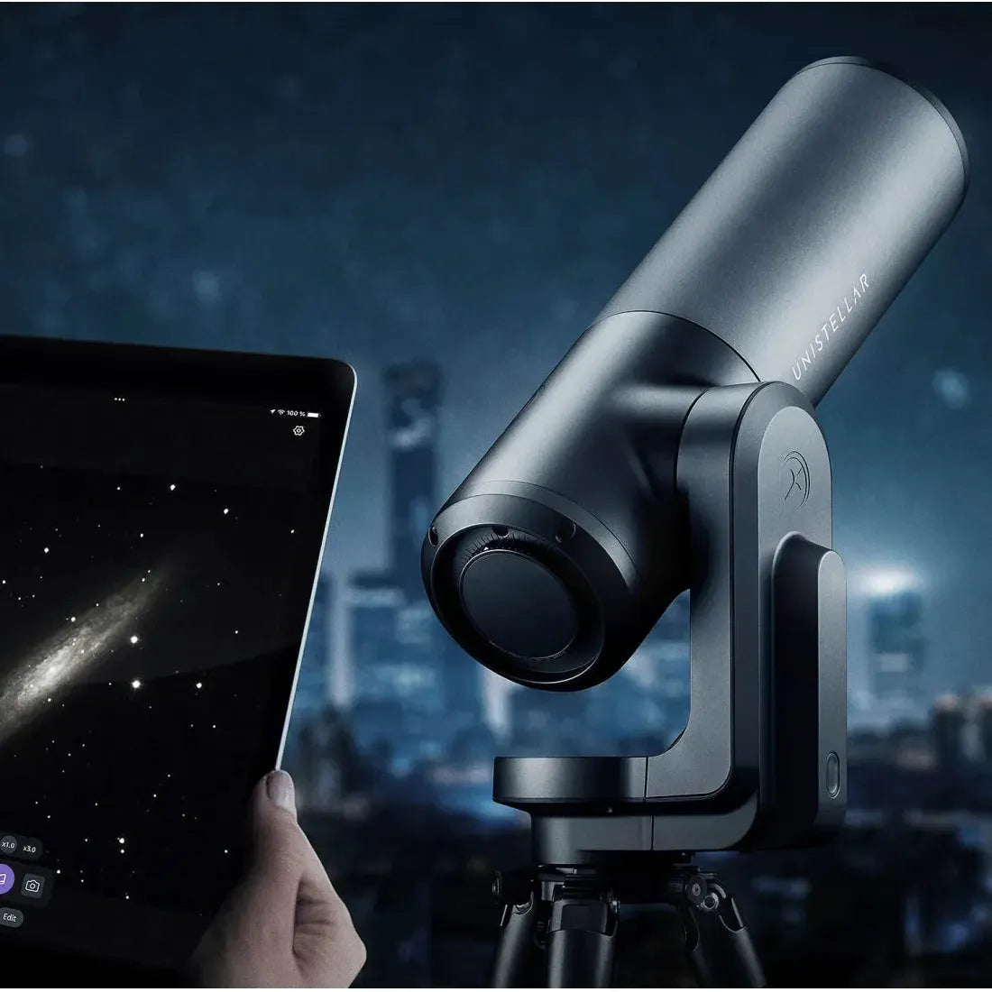 Person using the Unistellar eQuinox smart telescope while viewing celestial images through a connected smart tablet