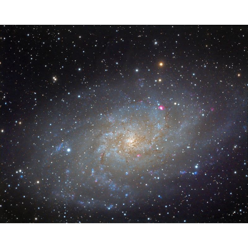 Image of the Triangulum Galaxy, also known as Messier 33, captured by Pedro Moreno & Carlos Malagon using the Omegon 104/650 ED Triplet telescope paired with an Atik460EX camera, demonstrating the impressive imaging capabilities of this equipment in capturing deep-sky objects with exceptional detail